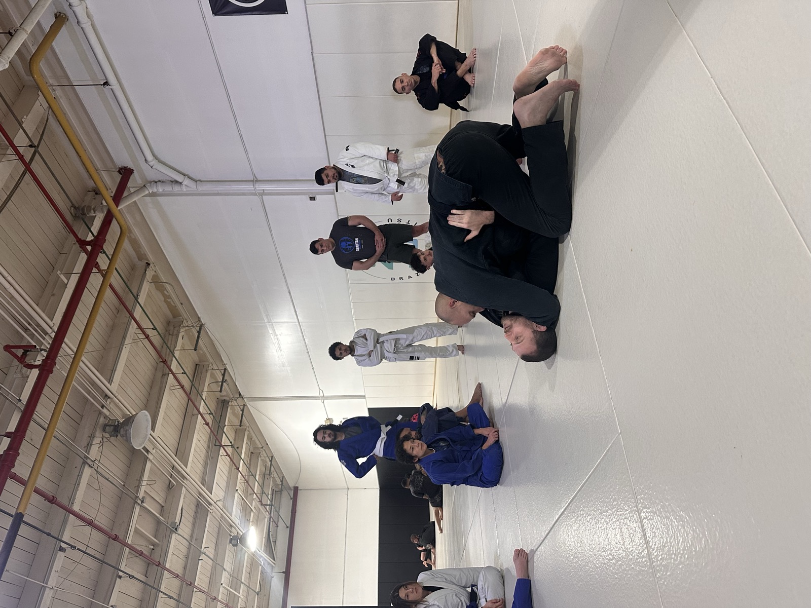 Adults training Brazilian Jiu Jitsu in gi at Zombie BJJ Allentown PA
