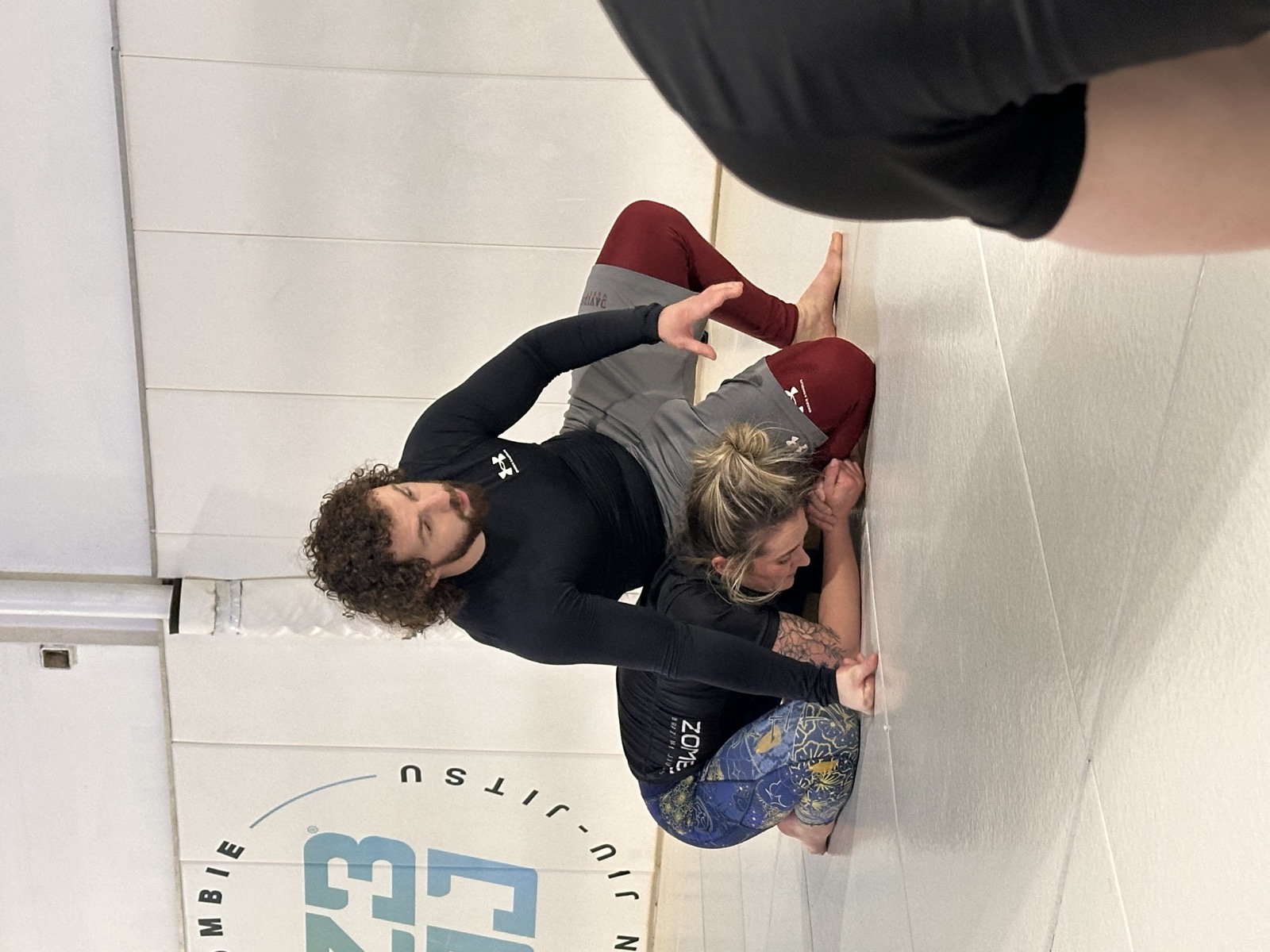 Coach teaching takedowns and wrestling for jiu-jitsu at Zombie BJJ Allentown PA